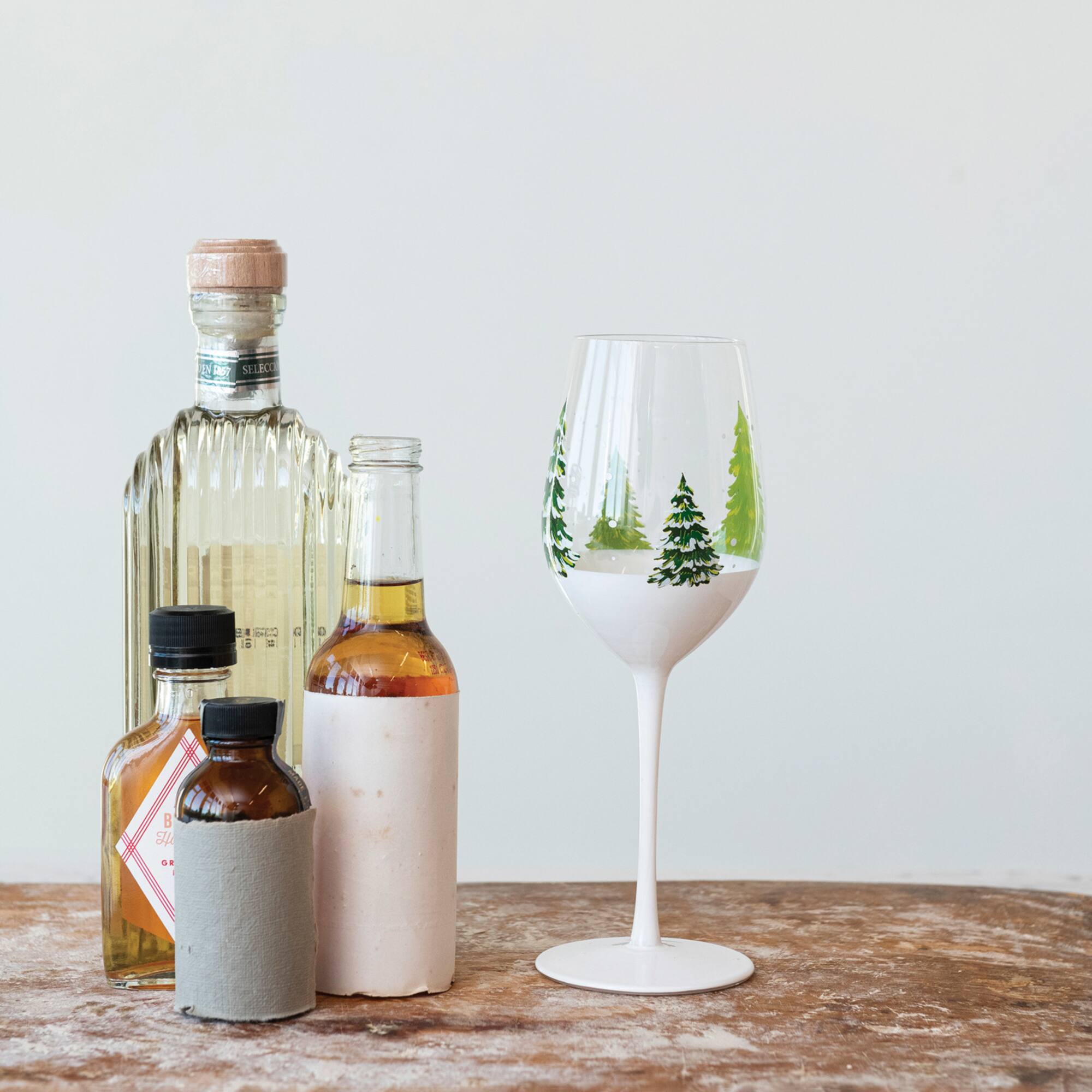 Hello Honey® 12oz. Clear & Green Tree & Snow Wine Glass Set